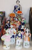 A collection of ten Staffordshire pottery figures and groups