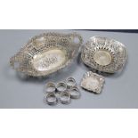 Three assorted white metal dishes, two German stamped 800 and a set of six small 835 napkin rings?