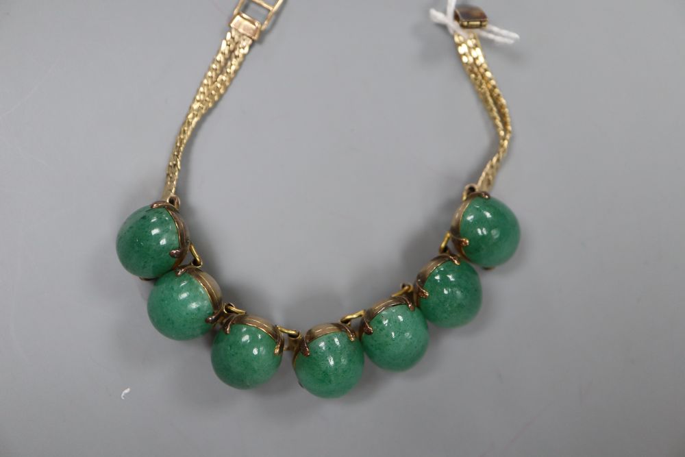 A 14k yellow metal and simulated cabochon jade set bracelet, 18.3cm, gross 33.4 grams. - Image 2 of 2