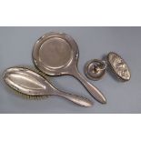 A 22ct gold ring, (lacking stone), 3.6 grams, a silver handled toilet mirror and brush, a silver