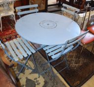 A blue painted circular folding garden table, 100cm diameter, H.72cm together with four folding