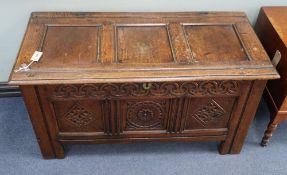 A 17th century oak coffer, W.122cm, D.57cm, H.63cm