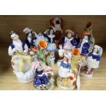 A Staffordshire pottery King Charles spaniel and seven various pottery figures and groups (8)