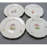A set of four Meissen dishes, painted with scattered floral sprigs
