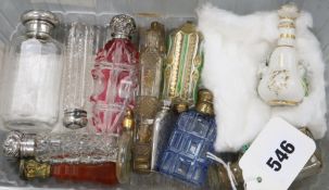 A small collection of assorted scent bottles including silver-mounted and an agate-handled gilt