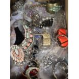 A large group of assorted costume jewellery.