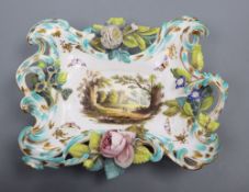 A 19th century Coalbrookdale porcelain two handled basket, painted with figures in a landscape and