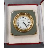 A Cartier travelling clock with box and papers