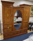 A Shapland and Petter satinwood and marquetry triple wardrobe, W.190cm, D.58cm, H.216cm