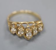 A modern 14k and graduated five stone marquise cut diamond half hoop ring, size M/N, gross 2.8