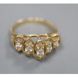 A modern 14k and graduated five stone marquise cut diamond half hoop ring, size M/N, gross 2.8