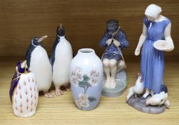 A Bing & Grondahl porcelain figure of a girl, a Royal Copenhagen figures, a pair of penguins, a vase