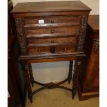 An 18th century style Italian olive wood chest on stand, fitted four drawers, W.62cm, D.31cm, H.