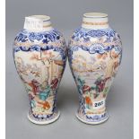 A pair of 18th century Chinese famille rose figural vases, height 25.5cm