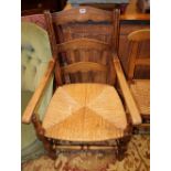 A pair of beech rush seat elbow chairs and a apir of 19th century French fruitwood chairs