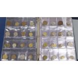 Two albums of world coins and other UK coinage including pennies