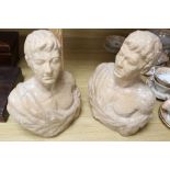 Two pink glass ceramic busts, tallest 33cm