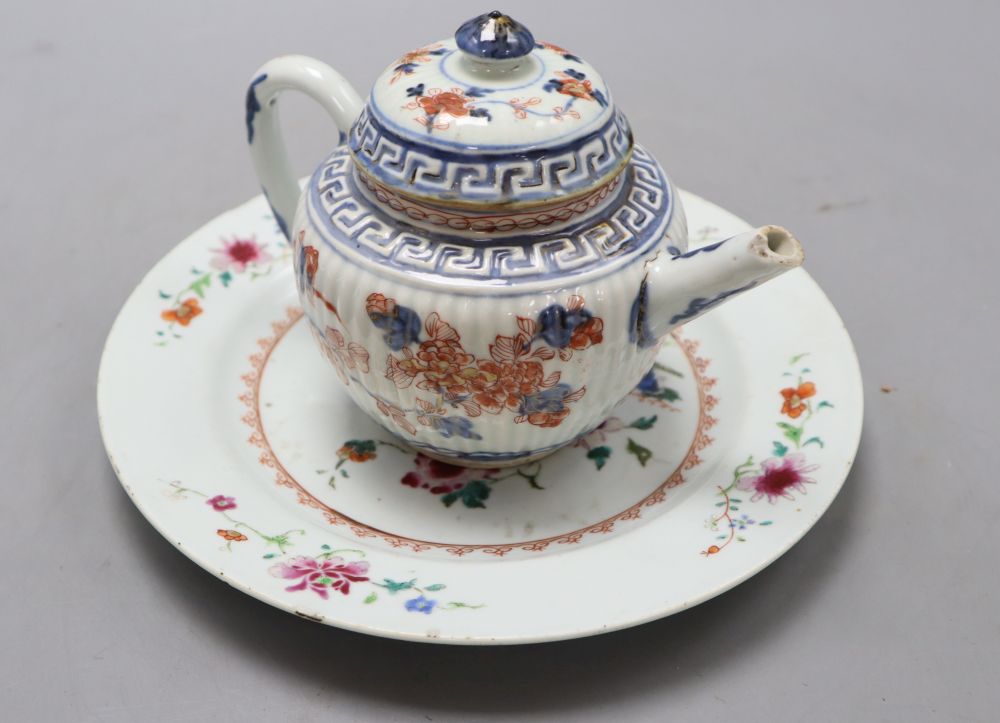 A 18th century Chinese famille rose dish, diameter 23cm, and an Imari porcelain teapot