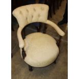 A Victorian stained wood show frame upholstered elbow chair