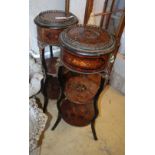 A pair of French marquetry three tier jardiniere tables, 34cm diameter, H.101cm