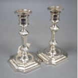 A pair of Edwardian 18th century style silver candlesticks, Gibson & Co Ltd, Sheffield, 1909,