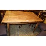 A 19th century fruitwood farmhouse table, planked top on square tapered legs, W.132cm, D.82cm, H.