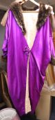 An early 1900 purple silk satin opera coat trimmed with marabou