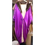 An early 1900 purple silk satin opera coat trimmed with marabou