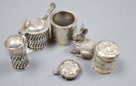 Small silver including a 'filled' miniature silver model rabbit, two silver condiments and three