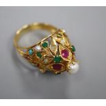 A modern yellow metal and multi gem set cocktail ring, size O/P, gross 11.5 grams.CONDITION:
