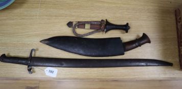 A WWI bayonet, a kukri and a dagger