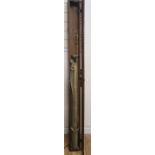 A Hardy oak and iron bound case containing three Hardys split cane fishing rods