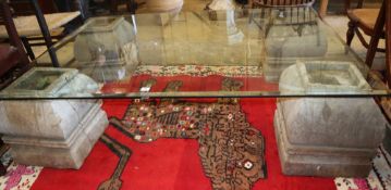 A rectangular bevelled glass top coffee table on four Indonesian bleached wood supports, W.152cm,