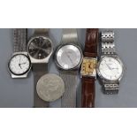 Five assorted gentleman's wrist watches including Skagen and Seiko and a coin.