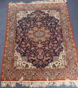 An Isphahan blue ground part silk rug, 142 x 105cm