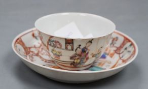 A Chinese famille rose tea bowl and saucer