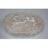 A late 19th century German Hanau embossed white metal oval box, J.D. Schleissner & Sohne, 16.2cm,