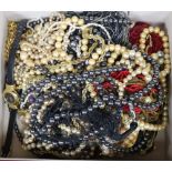 A box of costume jewellery.