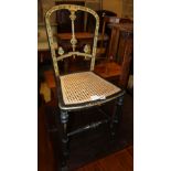 A Victorian black Japanned chair