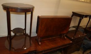 A Victorian walnut Sutherland table, W.90cm, D.16cm, H.64cm together with an Edwardian circular