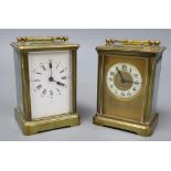 Two brass bound carriage timepieces, one with an enamelled dial, tallest 12cm with handle down