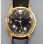 A 1960's? steel and gold plated Heuer black dial automatic wrist watch, on later associated strap.