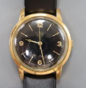 A 1960's? steel and gold plated Heuer black dial automatic wrist watch, on later associated strap.
