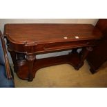 A Victorian mahogany side table, moulded frieze drawer, on bun feet with brass and porcelain