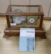 An Edwardian Art Nouveau barograph, inlaid with ebony, brass and copper, possibly Glasgow School,