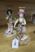 A pair of 19th century Minton figural candlesticks, height 24cm