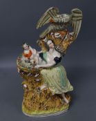 A large Staffordshire pottery group of a mother and eagle "Mother's Courage", height 40cm