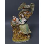 A large Staffordshire pottery group of a mother and eagle "Mother's Courage", height 40cm