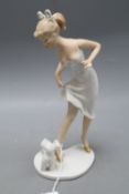 A Goebel figure of a woman and a poodle, height 23cm