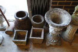 Four reconstituted stone garden planters